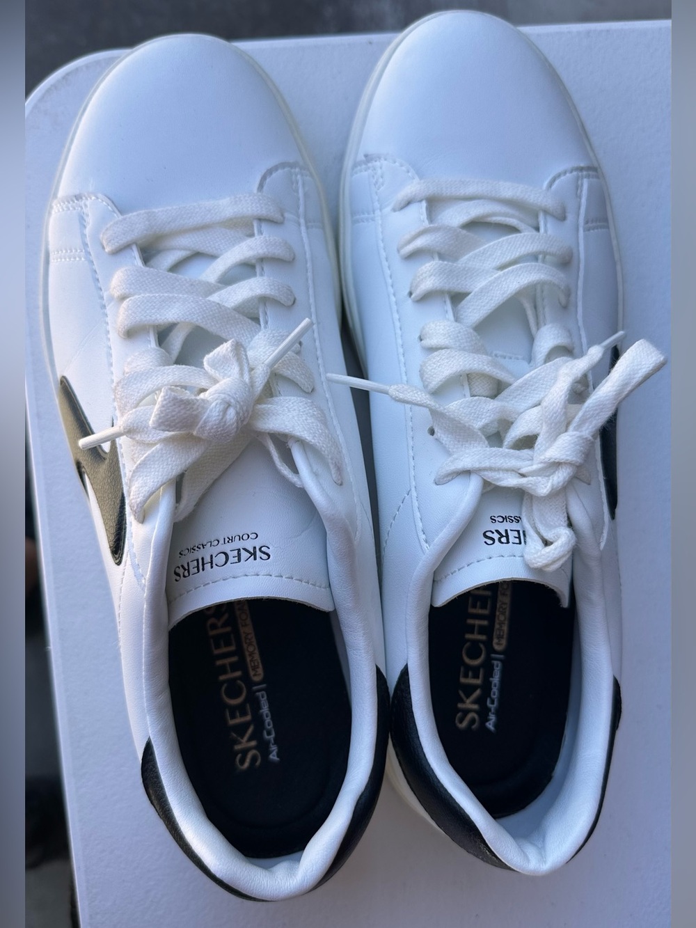 Skechers White Sneakers with Black Heel and Side Accent